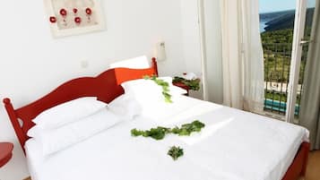Comfort Suite, Balcony, Sea View | Premium bedding, minibar, in-room safe, individually decorated