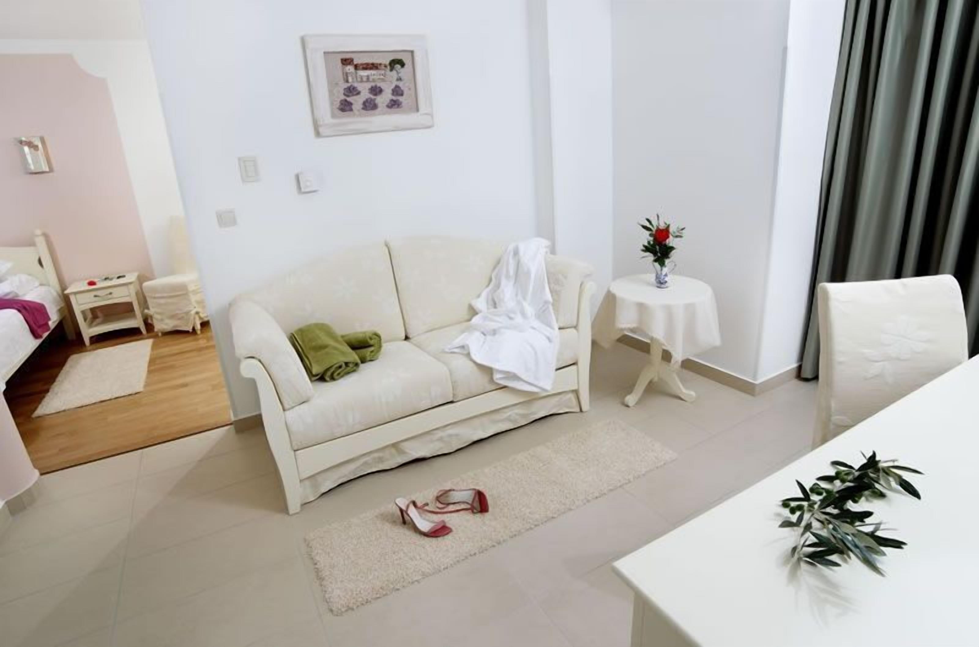 comfort double room, 1 double bed, balcony, sea view | living area | 55-cm tv with satellite channels