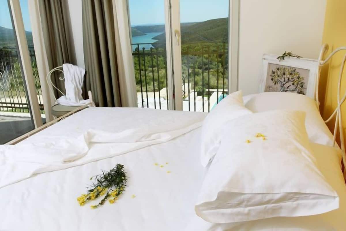 standard double room, balcony, sea view | premium bedding, minibar, in-room safe, individually decorated