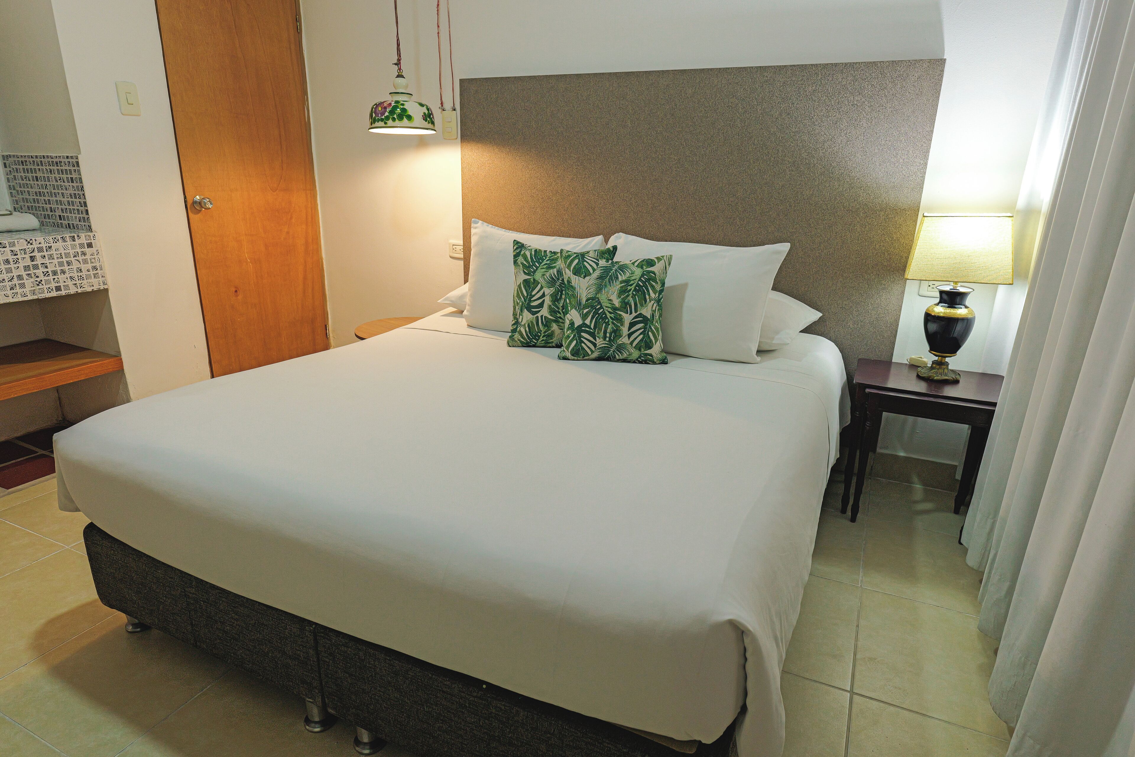 our petite | 1 bedroom, premium bedding, down duvets, in-room safe