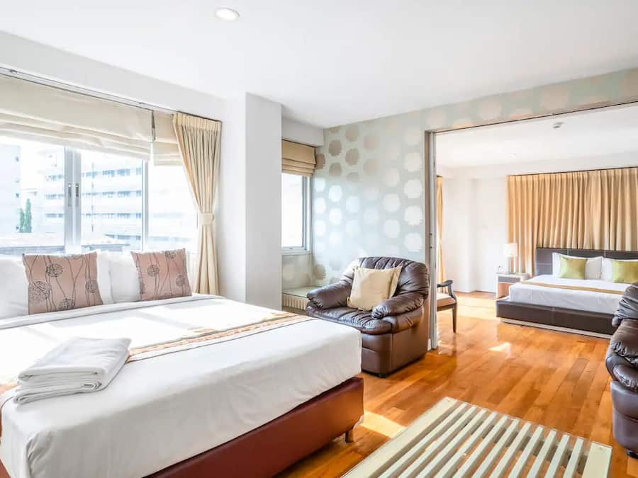 One Bedroom Suite (checkin 8am - 8pm) | Living area | 32-inch LCD TV with cable channels, TV, DVD player
