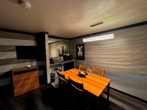 Luxury Studio Suite, 1 King Bed, Non Smoking, Jetted Tub | Living area | 40-inch LED TV with cable channels, TV