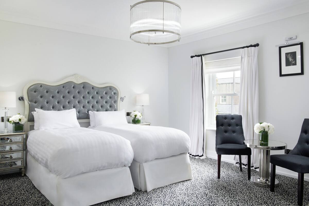 Deluxe Twin | Egyptian cotton sheets, premium bedding, in-room safe, desk