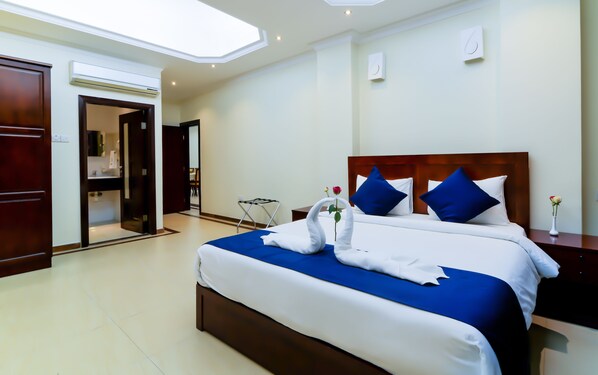Premium bedding, memory-foam beds, minibar, in-room safe