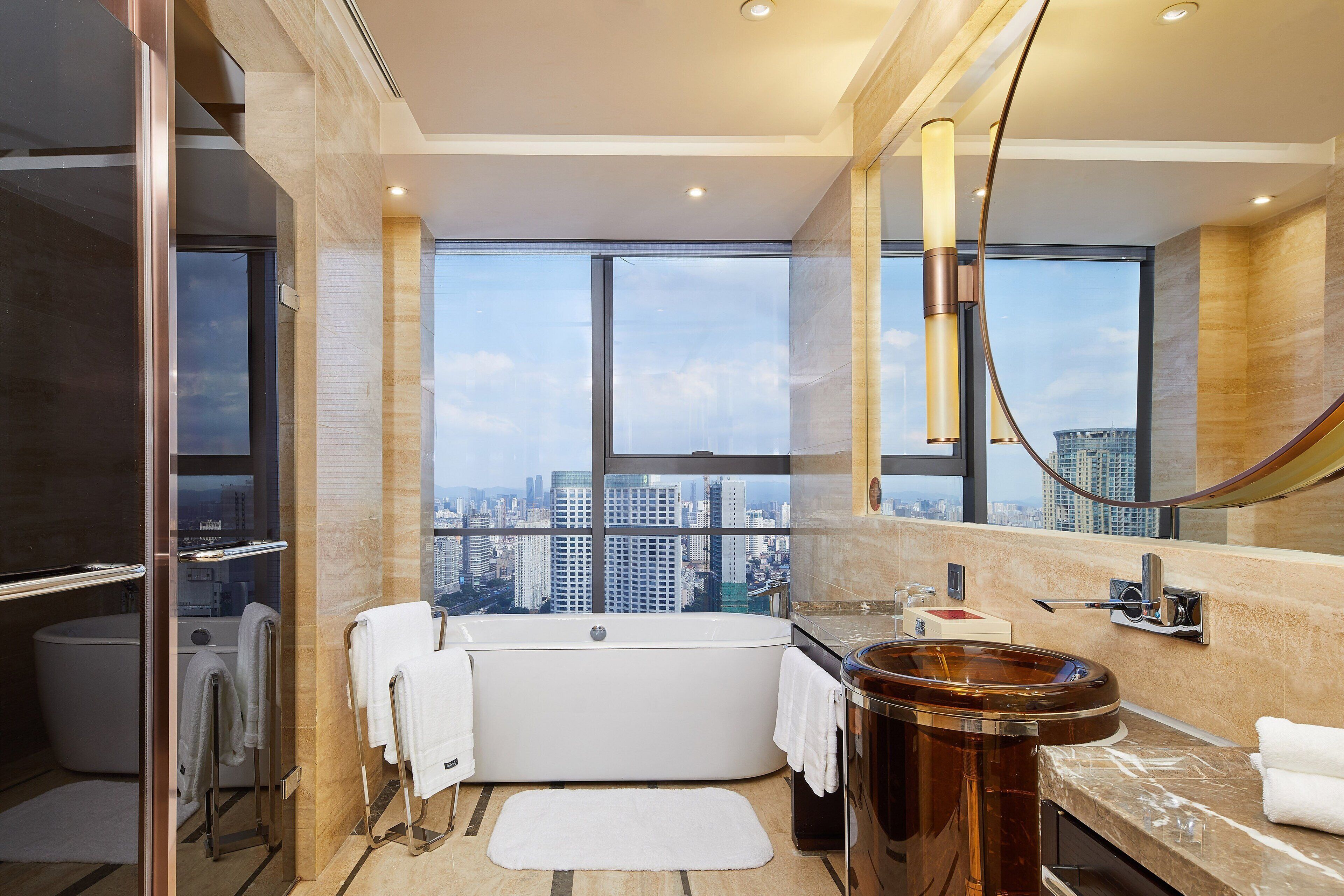 separate bathtub and shower, hair dryer, bathrobes, slippers