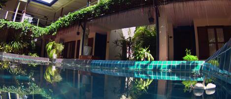 Outdoor pool, pool umbrellas, pool loungers