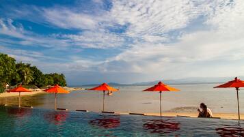 Outdoor pool, pool umbrellas, pool loungers