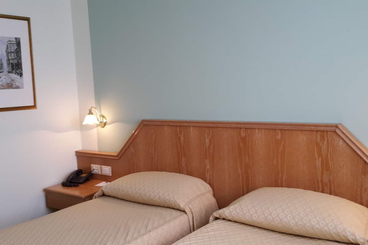 classic twin room | minibar, in-room safe, desk, laptop workspace