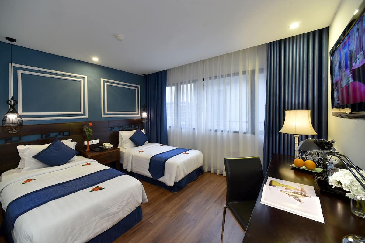 Deluxe Double or Twin Room | Minibar, in-room safe, individually furnished, desk