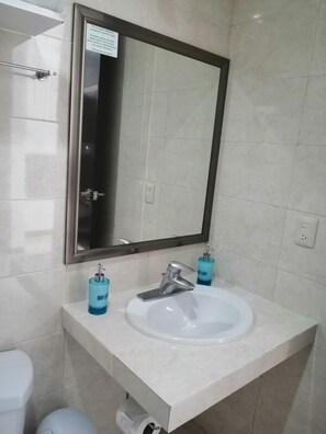 Shower, free toiletries, hair dryer, towels