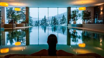 Indoor pool, open 7:00 AM to 10:00 PM, pool loungers