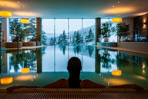 Indoor pool, open 7:00 AM to 10:00 PM, pool loungers