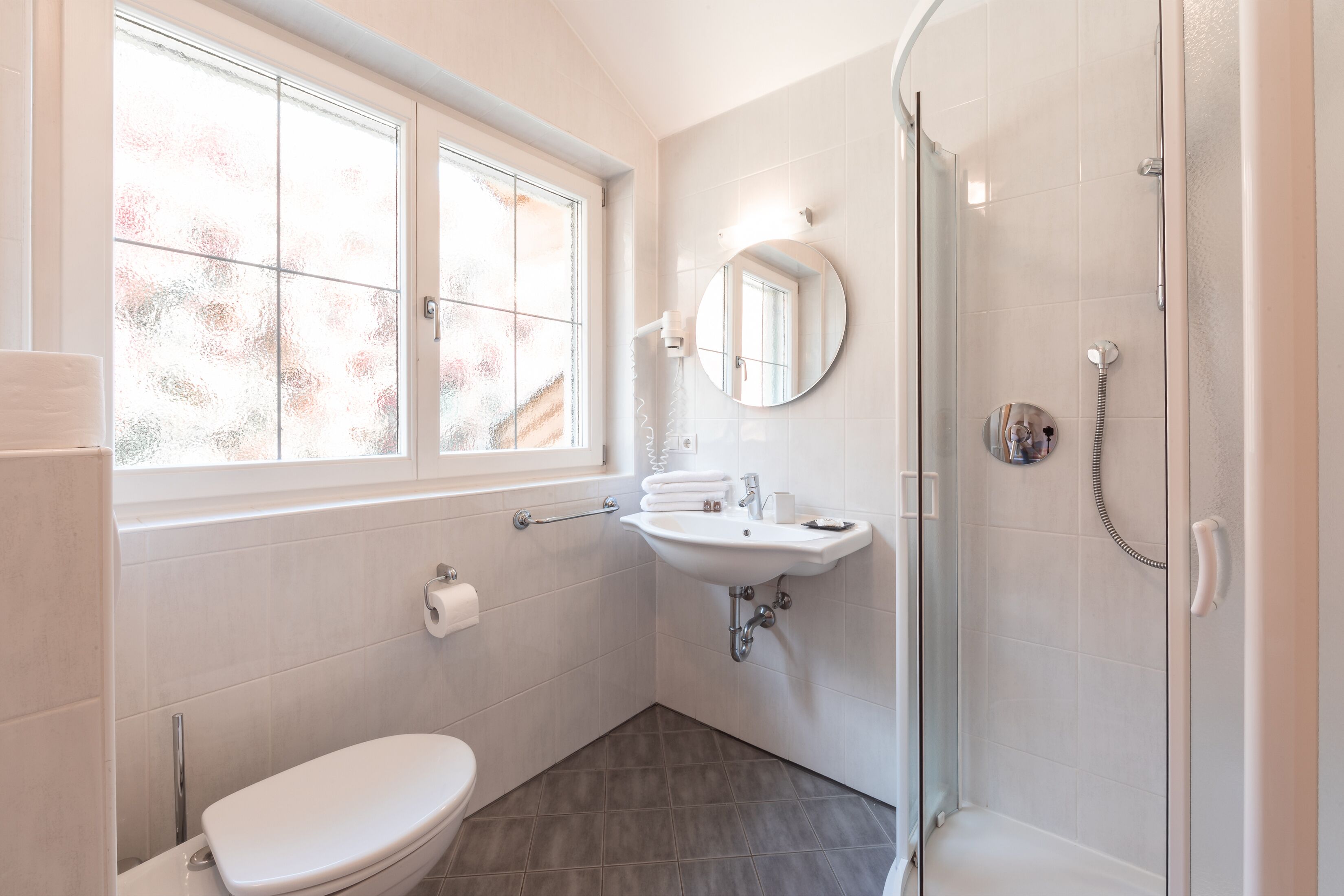 family room, garden view | bathroom | free toiletries, hair dryer, towels, soap