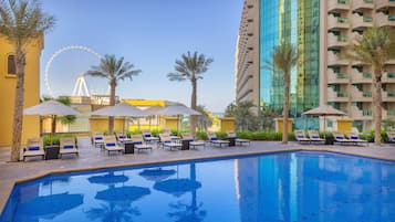 Outdoor pool, pool umbrellas, pool loungers