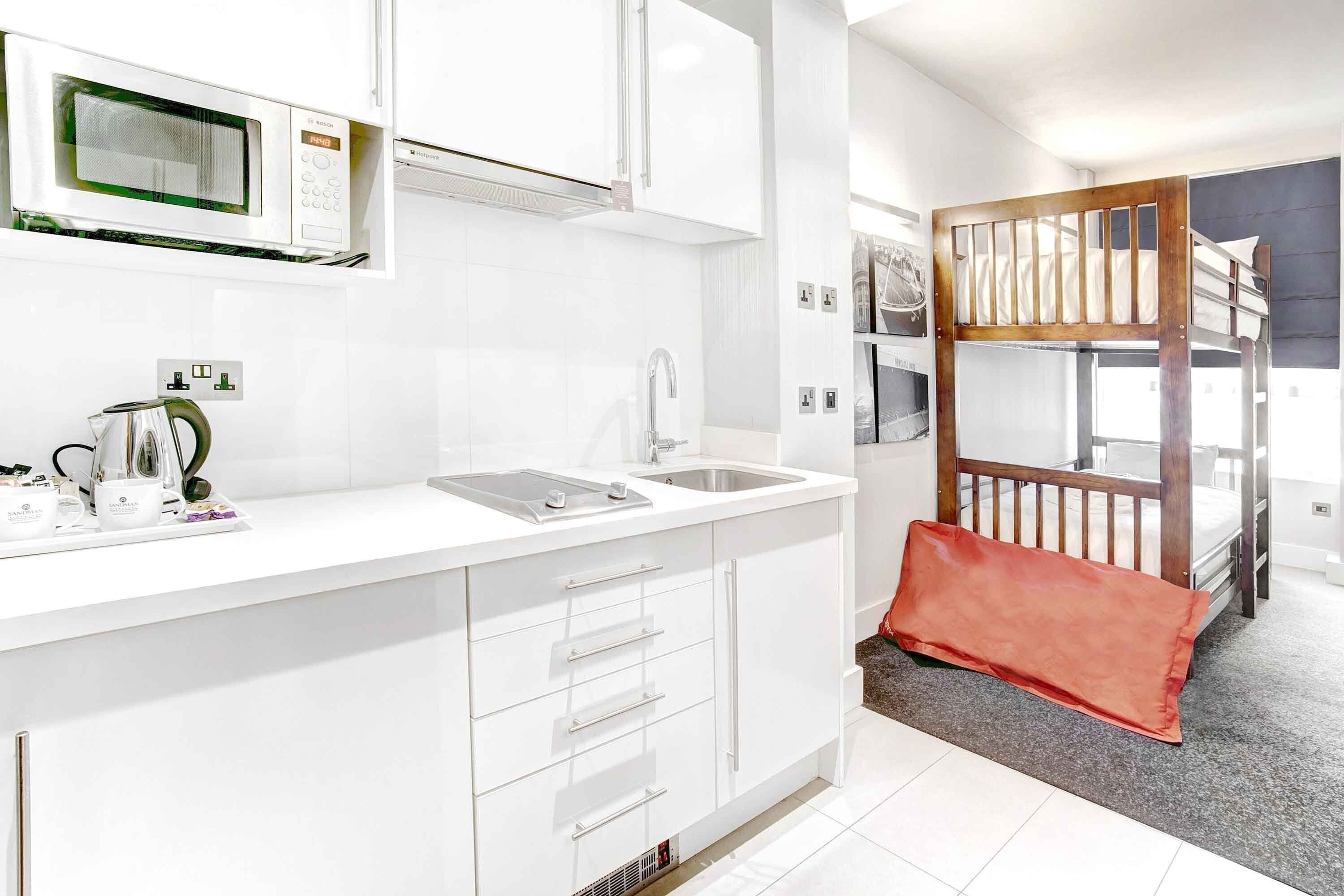 family suite, 1 king bed, bunk beds, kitchenette | 1 bedroom, pillow-top beds, in-room safe, desk