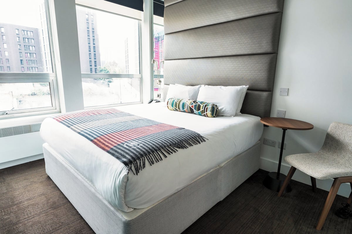 Executive Suite, 1 King Bed, Kitchenette, Balcony | Pillow-top beds, in-room safe, desk, blackout curtains