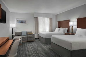 Premium bedding, desk, laptop workspace, blackout curtains