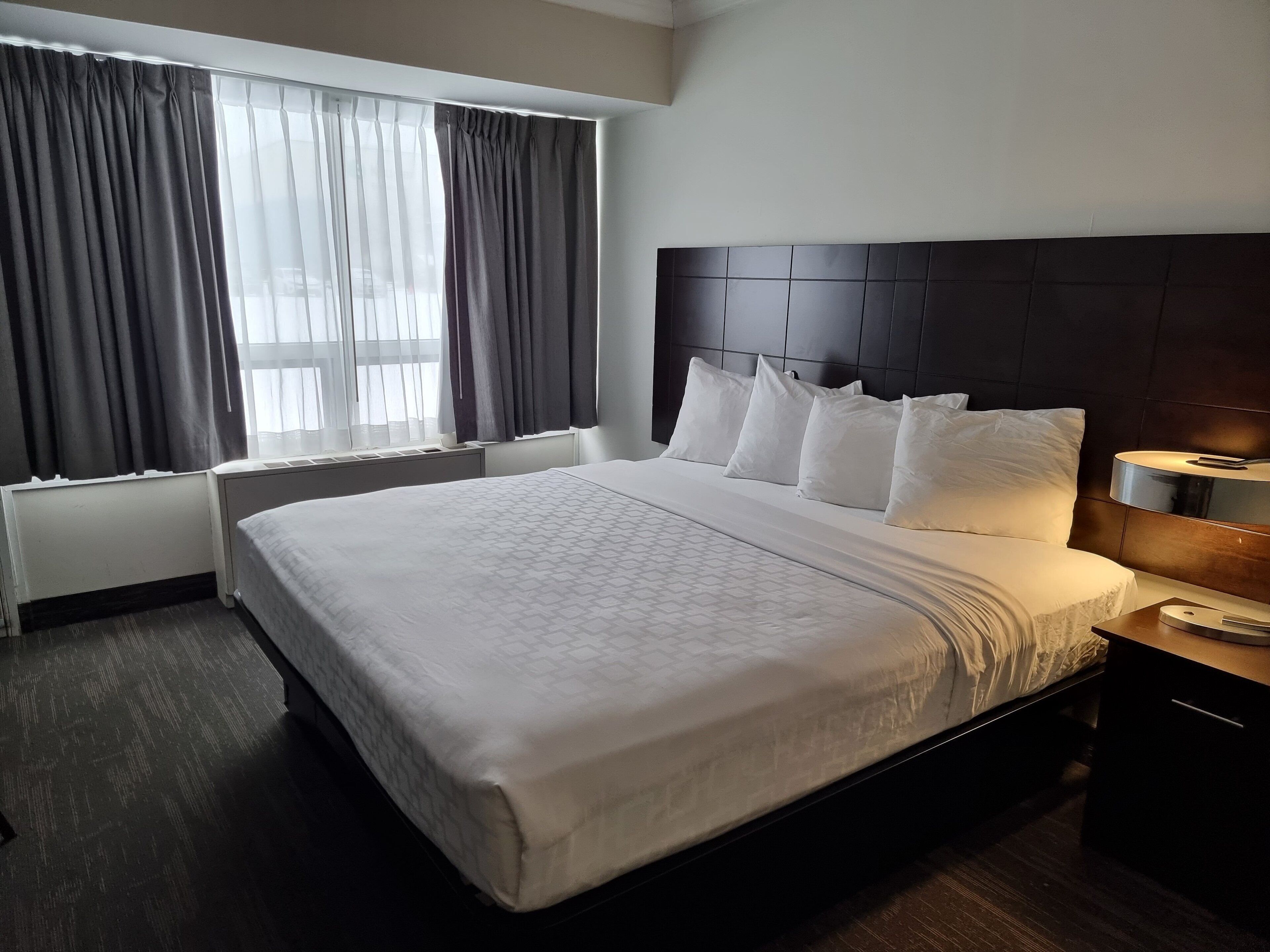 Kamer, 1 kingsize bed, niet-roken | Een bureau, een strijkplank/strijkijzer, babybedden, extra bedden