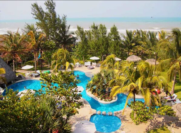 2 outdoor pools, pool umbrellas