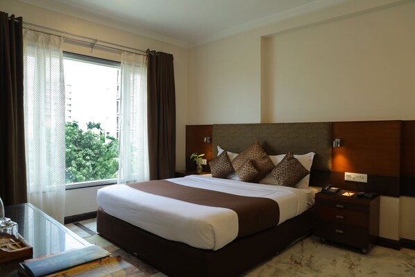 Pillow-top beds, minibar, in-room safe, desk