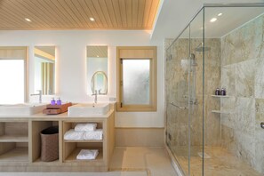 Bathroom | Hair dryer, bathrobes, slippers, towels