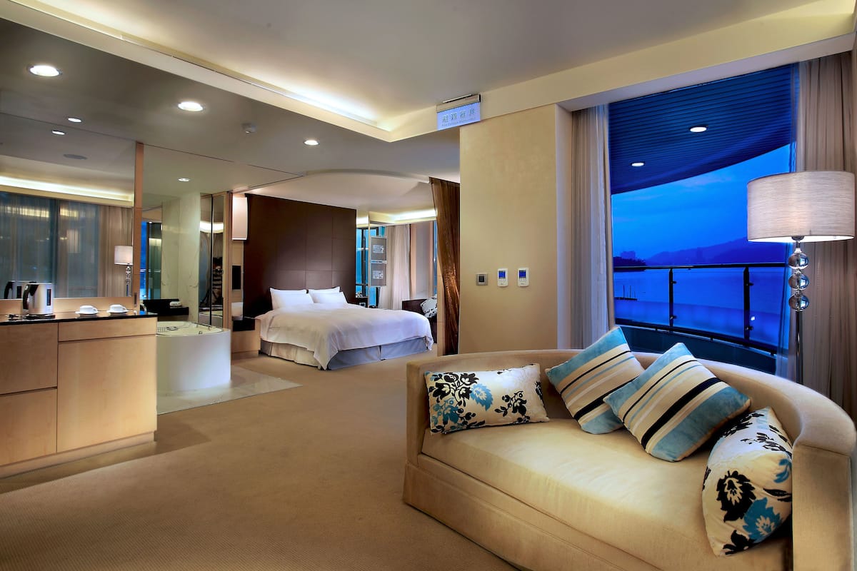 standard room, 1 double bed (lake) | living area | 40-inch lcd tv with cable channels, tv, dvd player