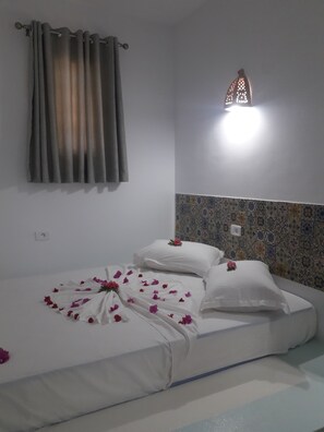 Family Room, Balcony | Blackout drapes, iron/ironing board, bed sheets - Hotel Le Beau Sejour (Mezraia)