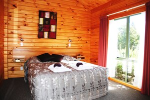 One Bedroom Spa Chalet (Queen) | Premium bedding, individually decorated, individually furnished