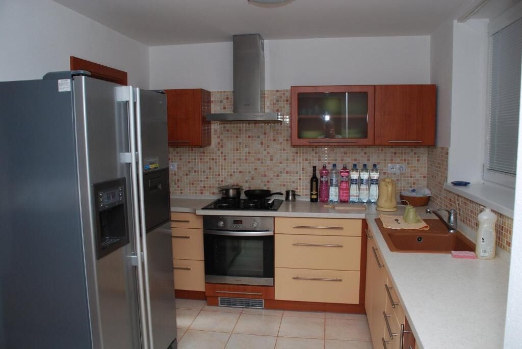 Full-size fridge, coffee/tea maker, cookware/dishes/utensils