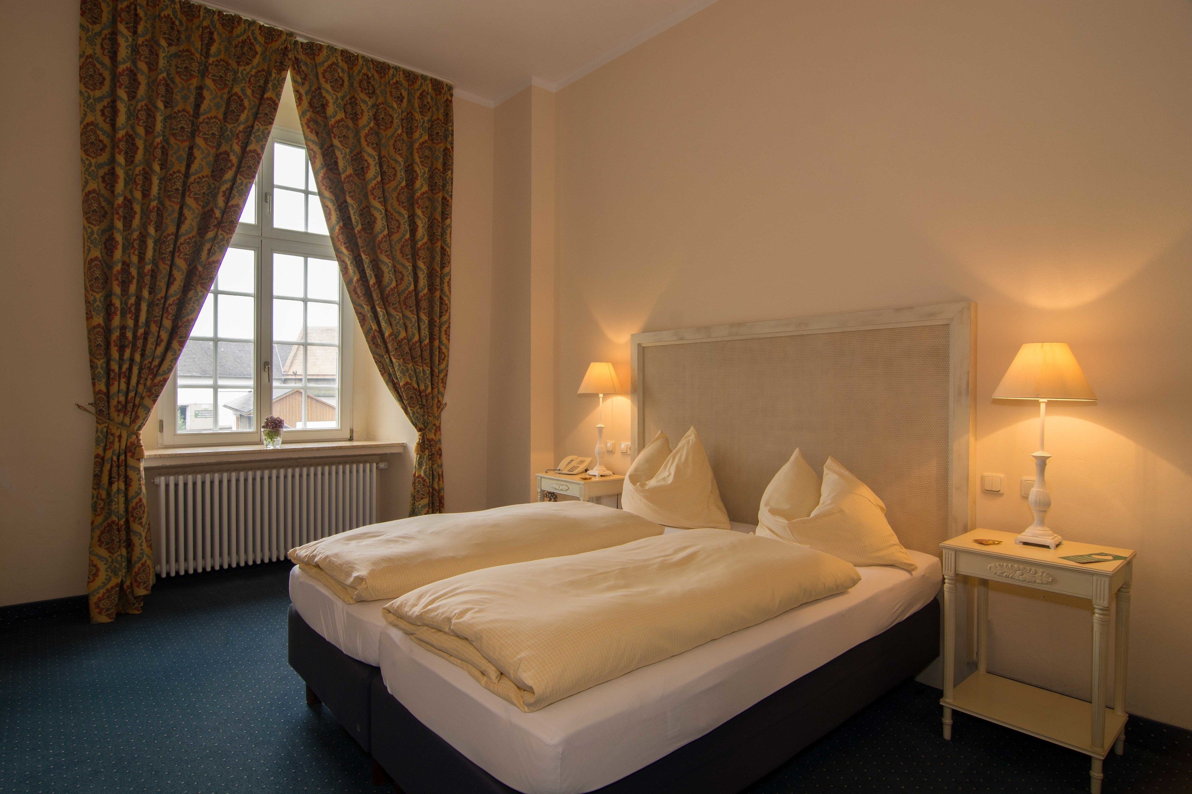 deluxe double room, park view | in-room safe, individually decorated, individually furnished, desk