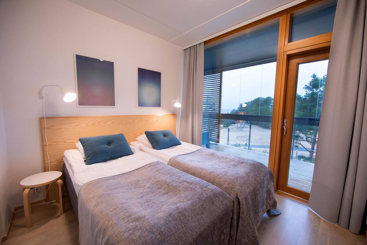 Apartment for two with a sauna and sea view | Langsir/tirai gelap terus, seterika/papan seterika, Wi-fi percuma 