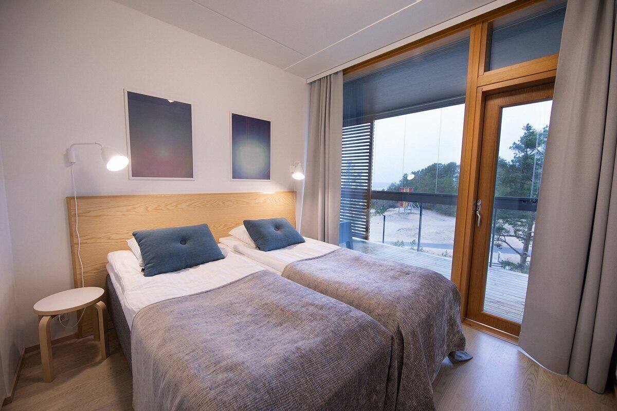 Apartment for six with a sauna and sea view | Langsir/tirai gelap terus, seterika/papan seterika, Wi-fi percuma 