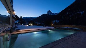 Indoor pool, outdoor pool, pool umbrellas, sun loungers