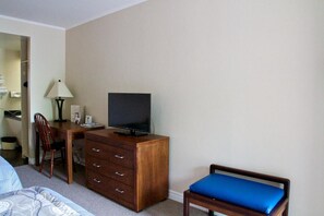 Individually furnished, desk, laptop workspace, iron/ironing board