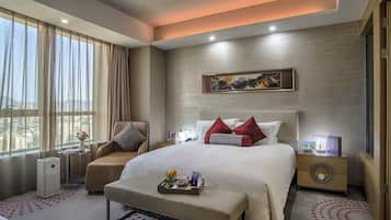 Premium bedding, down duvets, minibar, in-room safe