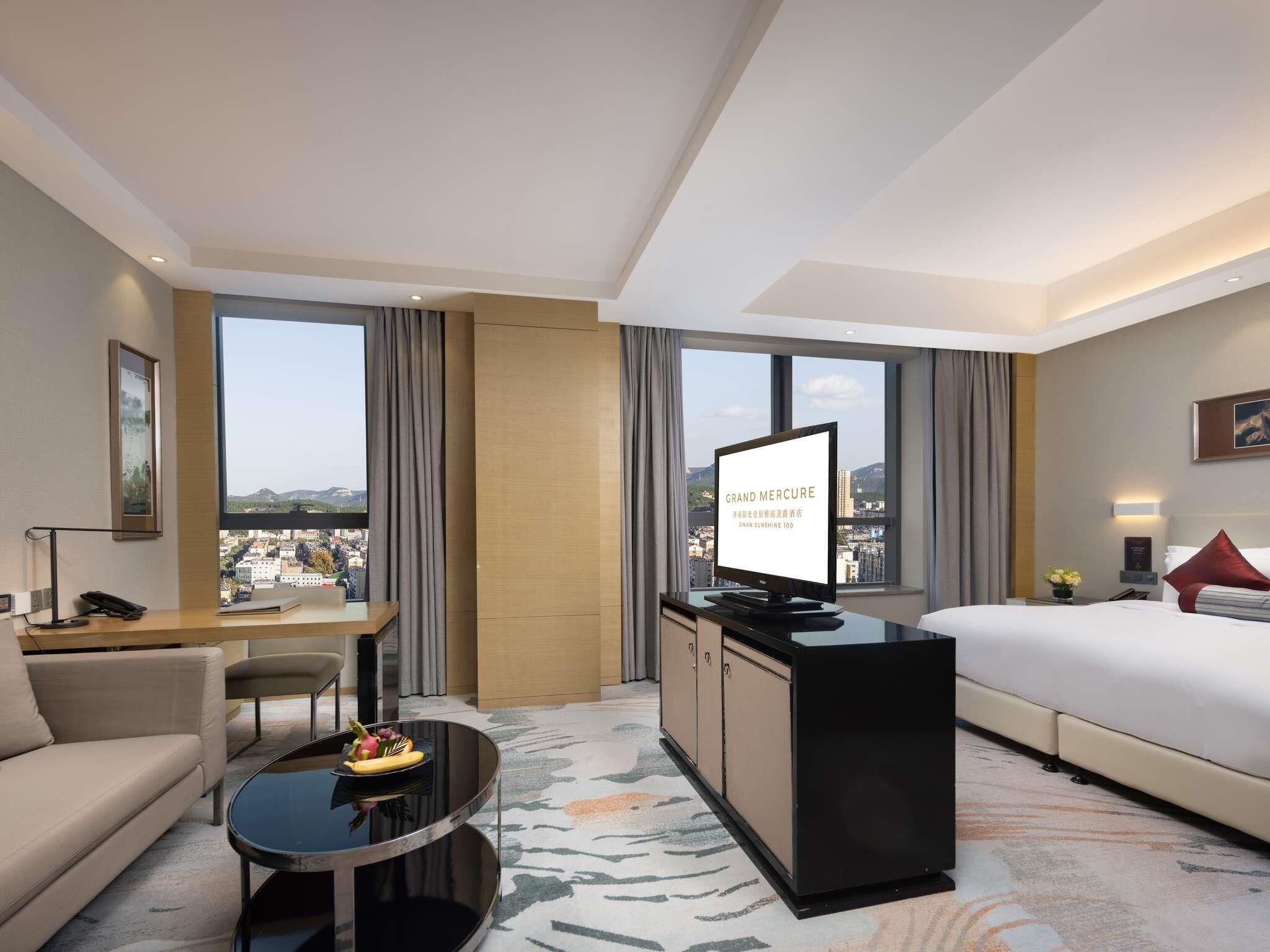 Quarto luxo, 1 cama King, vista para a cidade | Roupas de cama premium, edredons de pluma, frigobar, cofres nos quartos