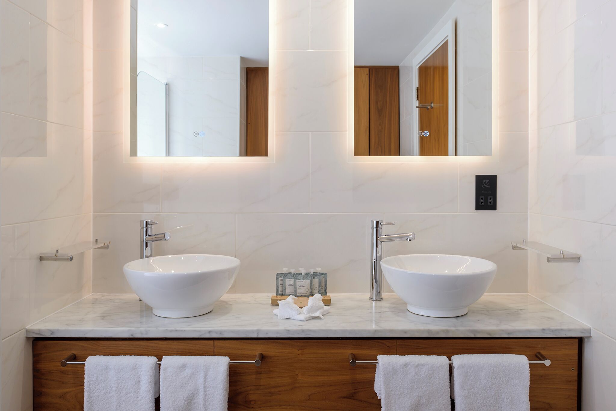 executive suite | bathroom | designer toiletries, hair dryer, towels
