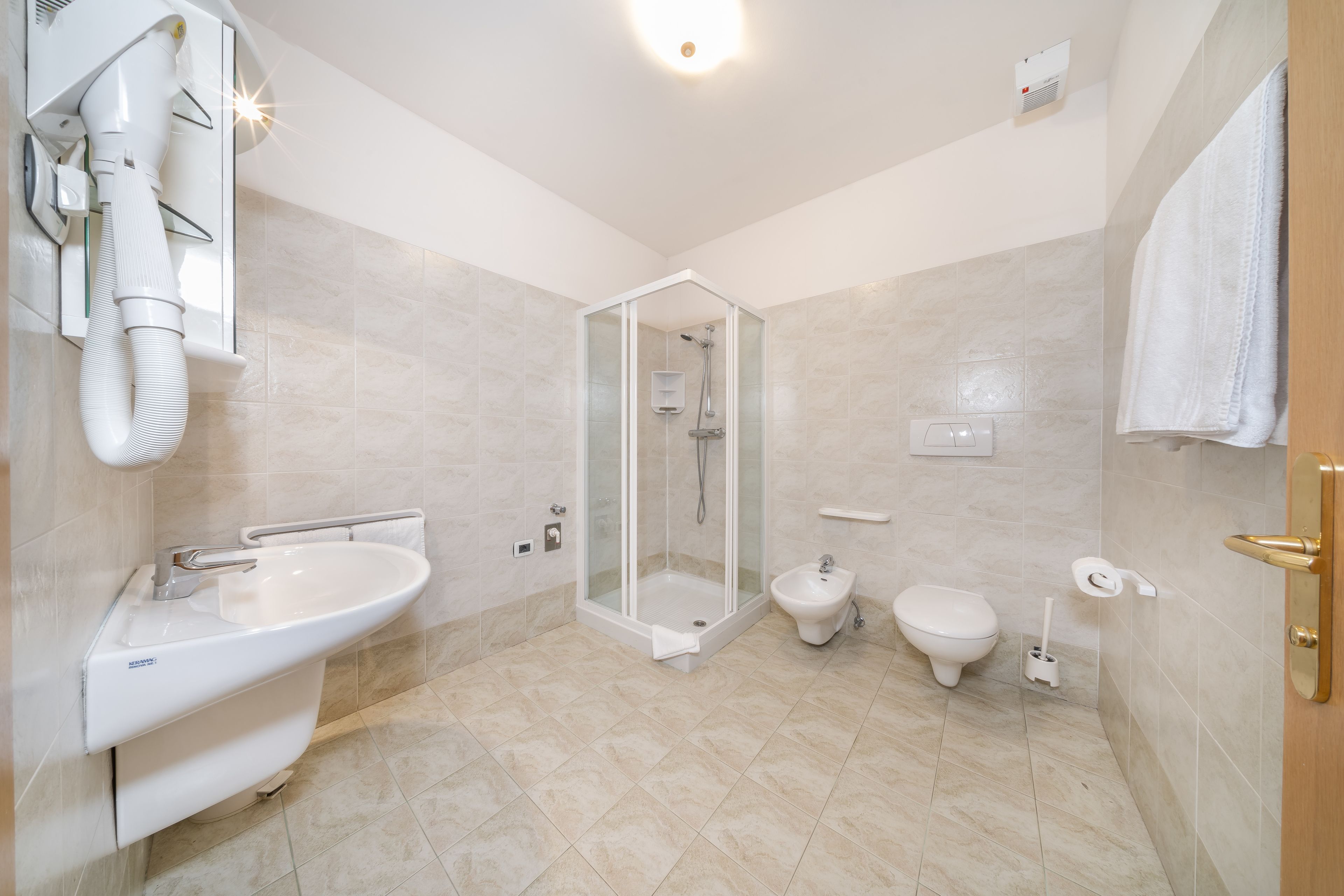family suite | bathroom | shower, free toiletries, hair dryer, bidet