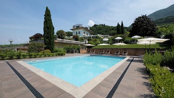 Seasonal outdoor pool, open 8:00 AM to 7:30 PM, sun loungers