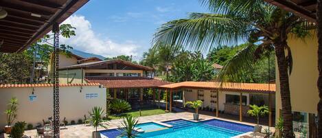 Outdoor pool, open 8:00 AM to 10:00 PM, sun loungers