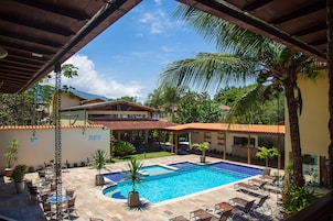 Outdoor pool, open 8:00 AM to 10:00 PM, pool loungers