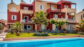 Indoor pool, open 10:00 AM to 8:00 PM, pool umbrellas, pool loungers
