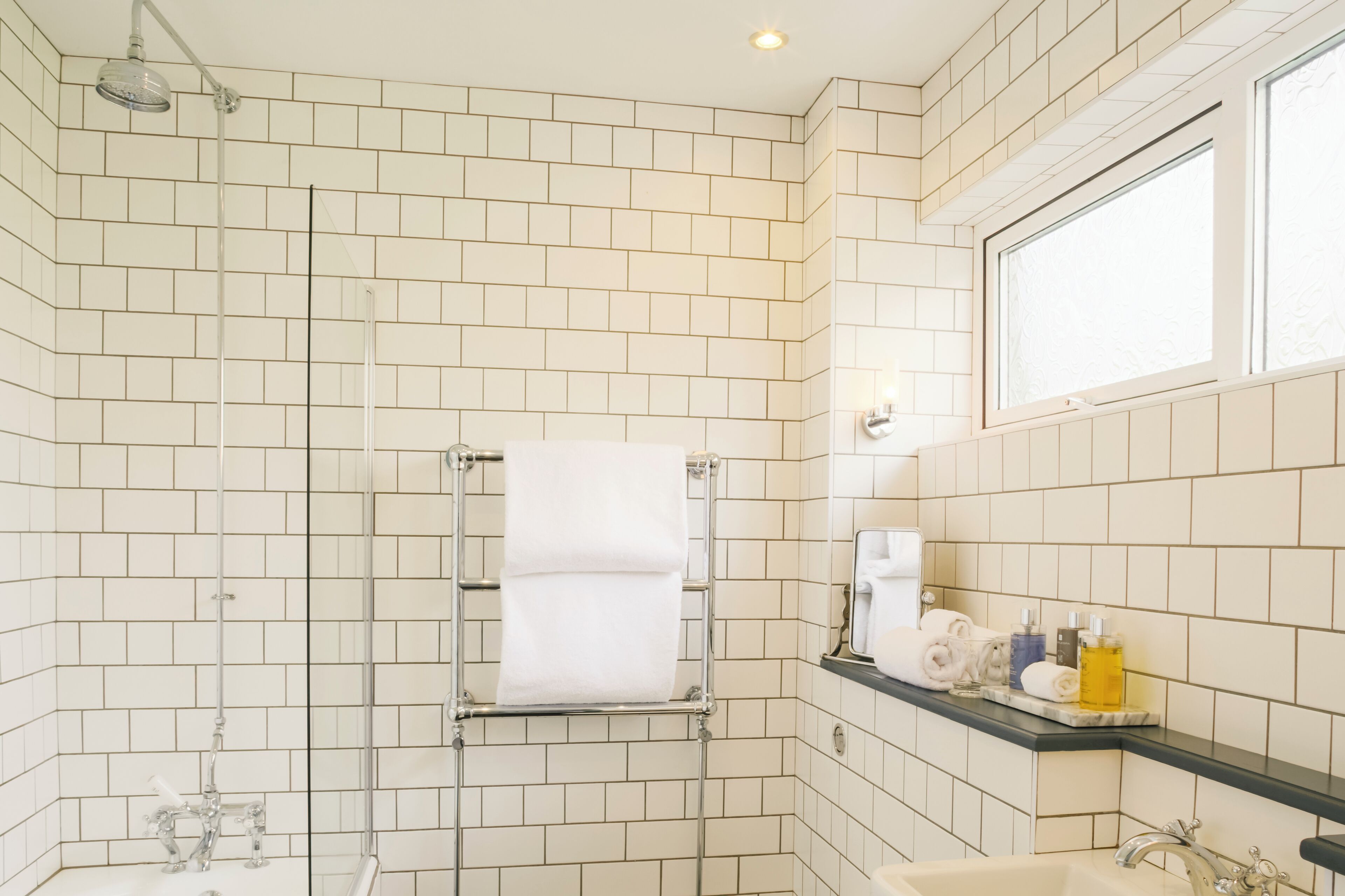 shower, rainfall showerhead, designer toiletries, hair dryer