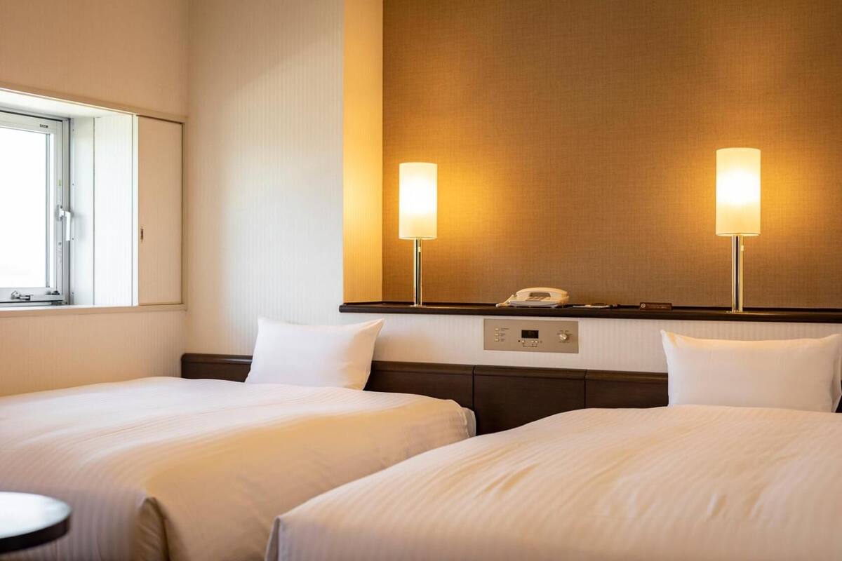 deluxe twin room, non smoking  (28sqm, bed size 120cm and 140cm) | desk, free wifi