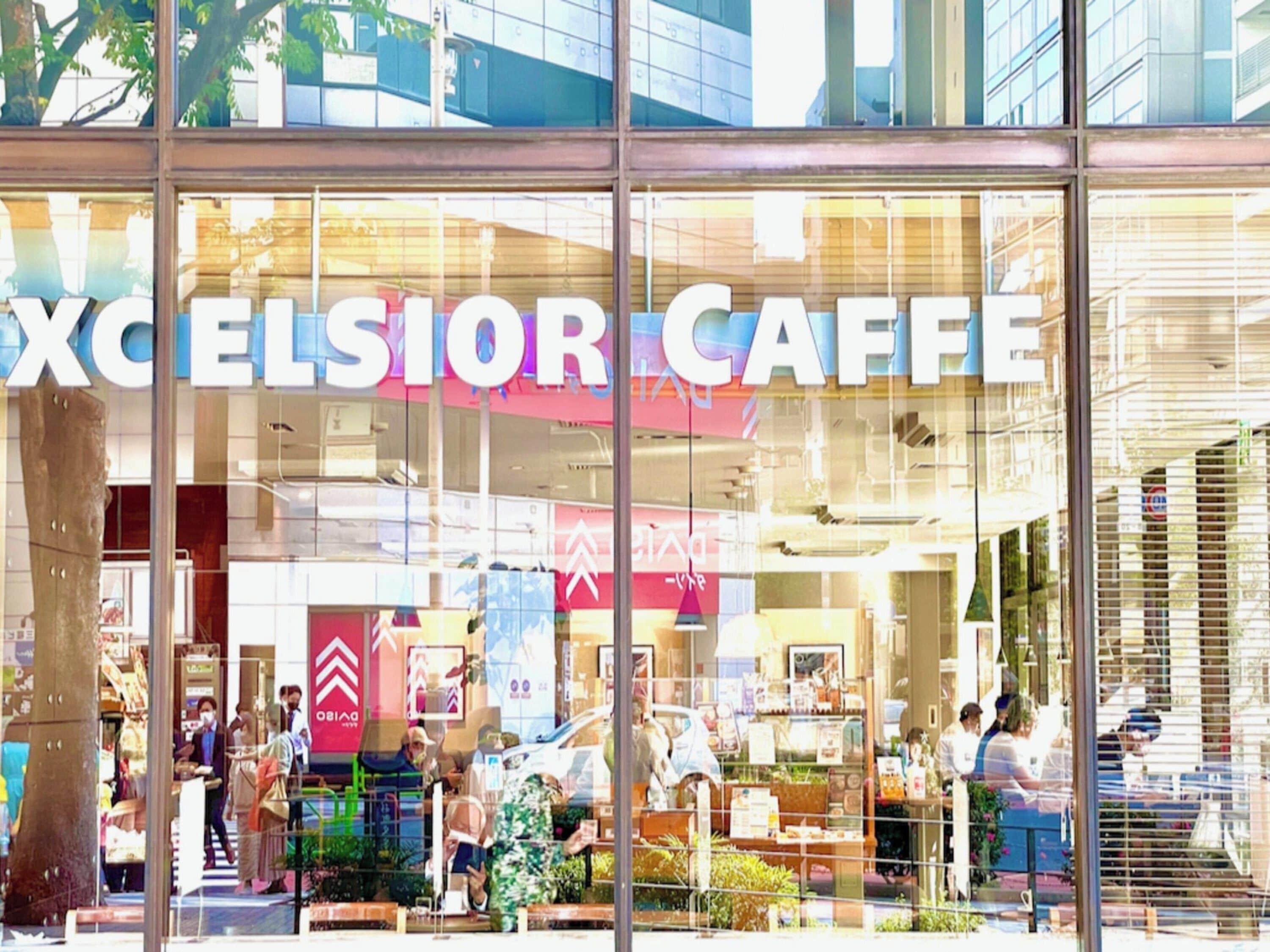 A storefront with large signage for 'EXCELSIOR CAFFÈ'.