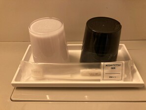 Combined shower/bathtub, free toiletries, hair dryer, bathrobes