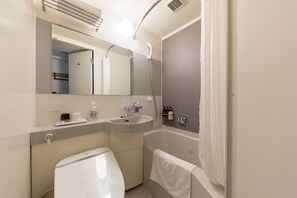 Combined shower/bathtub, free toiletries, hair dryer, bathrobes