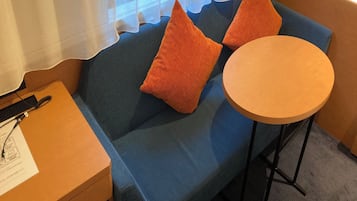 Down comforters, desk, blackout drapes, iron/ironing board