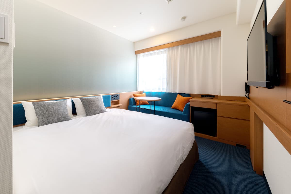 Down duvets, desk, blackout curtains, iron/ironing board