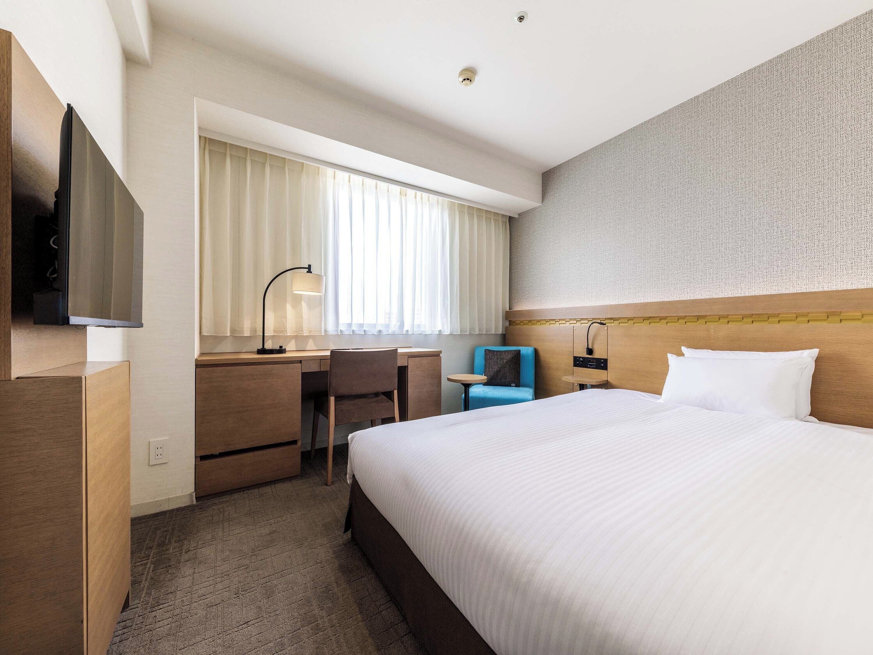 Literie de qualité supérieure, coffres-forts dans les chambres, bureau